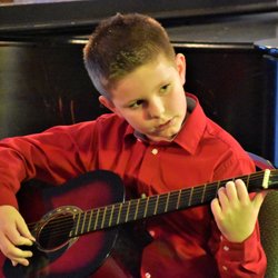 Quality Music and Dance - Chesapeake - Quality Music and Dance Guitar Student