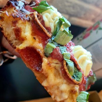 Frico - A side view of the thickness of a Detroit-style Pizza here at Frico's - Pizza Near Me - Sacramento, California Frico - A side view of the thickness of a Detroit-style Pizza here at Frico's - Pizza Near Me - Sacramento, California