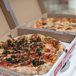 Kale and pepperoni pizza