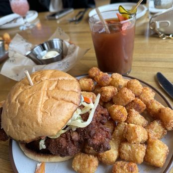 Earl Giles Distillery - Fried chicken sandwich with tots (Tennessee hot) - Distilleries Near Me - Minneapolis, Minnesota Earl Giles Distillery - Fried chicken sandwich with tots (Tennessee hot) - Distilleries Near Me - Minneapolis, Minnesota