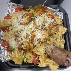 Kingz Turkee Shack - Blackened Pasta entree- bow tie pasta, house sauce, green onions, tomatoes, shrimp, parmesan cheese all over juicy turkee leg