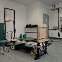 Greendale Physical Therapy - Pilates reformer, medicine balls