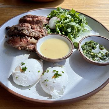 Yardbird Table & Bar - Steak and eggs. I asked for the eggs to be poached - Southern Near Me - Miami Beach, Florida