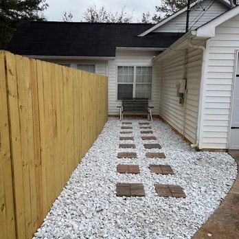 J2 Lawn Maintenance - a white house with a wooden fence - Lawn Services Near Me