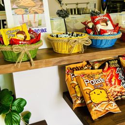 a variety of snacks on a shelf