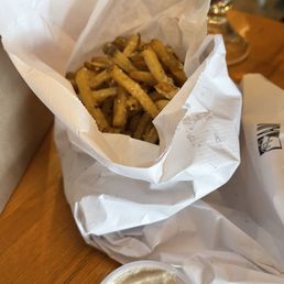 Parmesan Truffle Fries. Kinda soggy. Taking home to air fry Parmesan Truffle Fries. Kinda soggy. Taking home to air fry