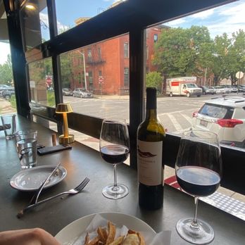 La Barrita Restobar - View from the high top with the garage window - Steakhouses Near Me - Baltimore, Maryland