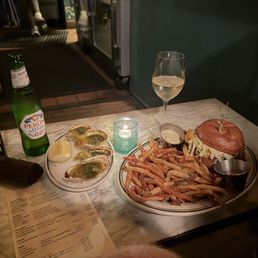 broiled oysters, fish sandwich, orange wine, peroni zero