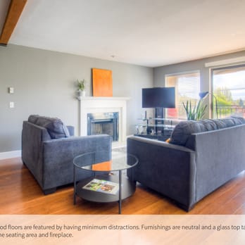 Jump Start Staging - Pops of orange add warmth and echo the warm tones of the new flooring. - Home Staging Near Me Jump Start Staging - Pops of orange add warmth and echo the warm tones of the new flooring. - Home Staging Near Me