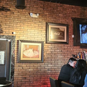 The Ravens Nest - Lily Munster & Grandpa on video screen - Breakfast & Brunch Near Me - Quartz Hill, California
