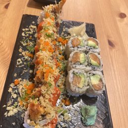 Left: 1st street roll (similar to a monster roll) shrimp tempura, spicy tuna, crunch and fish egg. Yum! Right: tuna roll Left: 1st street roll (similar to a monster roll) shrimp tempura, spicy tuna, crunch and fish egg. Yum! Right: tuna roll