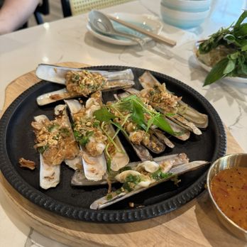 Ocean Grill & Bar - O22. Oc Mng Tay Nuong Mo Hnh Grilled Razor clams w/ scallion oil - Vietnamese Near Me - Chicago, Illinois Ocean Grill & Bar - O22. Oc Mng Tay Nuong Mo Hnh Grilled Razor clams w/ scallion oil - Vietnamese Near Me - Chicago, Illinois