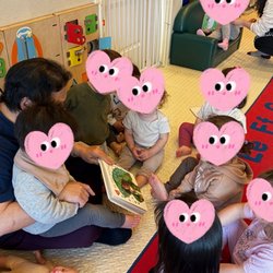 Amy's Family Child Care - Group reading time