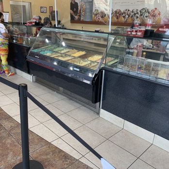 Coldstone Creamery - a woman standing in front of the counter - Ice Cream & Frozen Yogurt Near Me - Williamsburg, Virginia Coldstone Creamery - a woman standing in front of the counter - Ice Cream & Frozen Yogurt Near Me - Williamsburg, Virginia