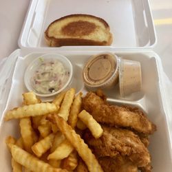 Guthrie’s - Box with extra sauce. (The extra sauce costs extra)