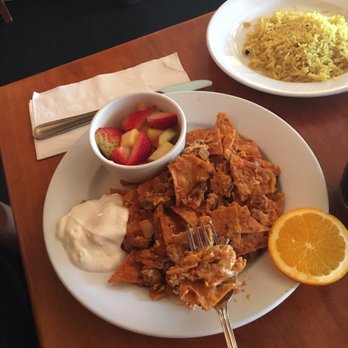 Hugo's - Chilaqiles with fresh fruit and rice - Breakfast & Brunch Near Me - Studio City, California