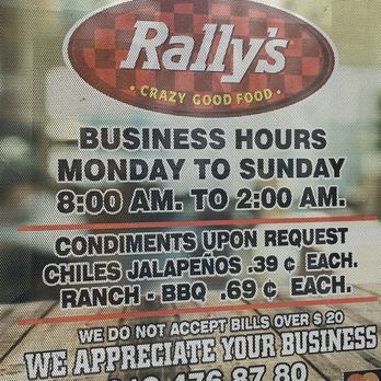 Rally's - a sign for a business hours - Burgers Near Me - Chula Vista, California