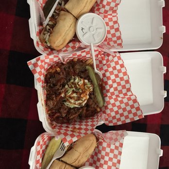 Harris' Smokehouse BBQ - hree trays of food - Food Trucks Near Me