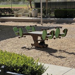Aliso Viejo Community Park - There's no way a 2 yr old (or even a 5 year old) can climb this & there are sharp corners exposed underneath that should be covered.