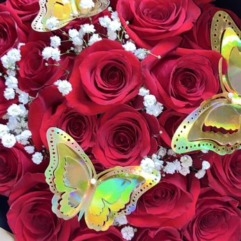 Susy's Flowers - Red roses with a mix of baby breathes and custom butterfly accessories. - Florists Near Me - South Gate, California Susy's Flowers - Red roses with a mix of baby breathes and custom butterfly accessories. - Florists Near Me - South Gate, California