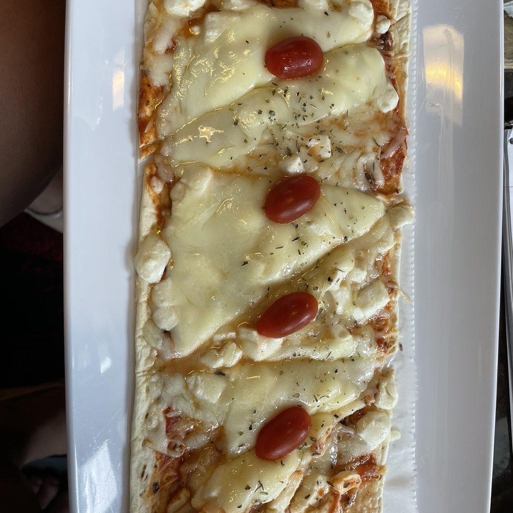 Baldwin Perk - Quattro Formagio Flatbread - Cafes Near Me - Orlando, Florida Baldwin Perk - Quattro Formagio Flatbread - Cafes Near Me - Orlando, Florida