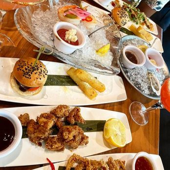 STK Steakhouse - Happy hour spread. - Steakhouses Near Me - Chicago, Illinois STK Steakhouse - Happy hour spread. - Steakhouses Near Me - Chicago, Illinois