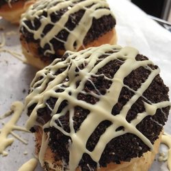 Huckleberry's Doughnuts - The Bitch! Filled with Chocolate Mousse, Dipped in Nutella and crushed Oreo and drizzled with white chocolate.