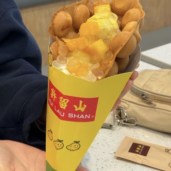 Hui Lau Shan - Hong Kong Egg Waffle with Mango Ice Cream - Desserts Near Me - Austin, Texas Hui Lau Shan - Hong Kong Egg Waffle with Mango Ice Cream - Desserts Near Me - Austin, Texas
