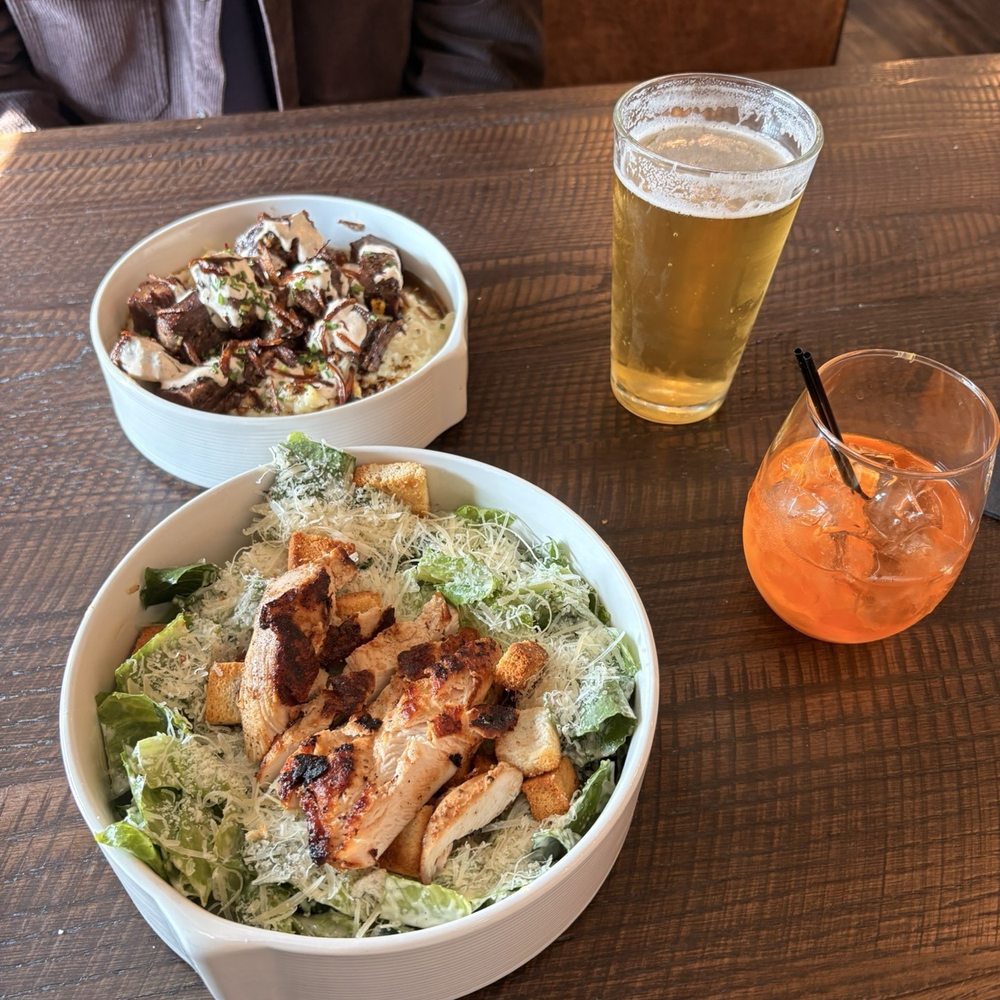 The Industry - Chicken Caesar salad, steak and potato bowl, aperol spritz, light beer - Cocktail Bars Near Me - Akron, Ohio