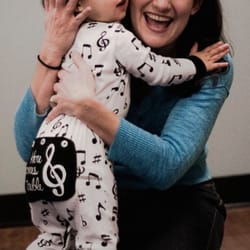 Ms.Clara's Mini Musicians - Ms. Clara gets a special hug from a very musical toddler