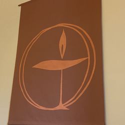 First Unitarian Universalist Society - Large banner of the Unitarian Universalist symbol; a chalice and flame