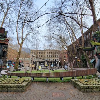 Pioneer Square - By Duane Pasco, a PNW artist, "The Bear" on the left, "Tsonqua" on the right. 1975 - Parks Near Me - Seattle, Washington