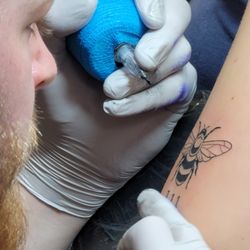 Revelation Tattoo and Body Piercing - First tattoo... perfection from Adam