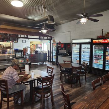 Famous Foods - There are a few tables for dine in customers. - Barbeque Near Me - Lake Charles, Louisiana