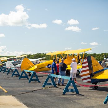 Sound Aircraft Services - a row of small airplanes - Airport Terminals Near Me - Wainscott, New York Sound Aircraft Services - a row of small airplanes - Airport Terminals Near Me - Wainscott, New York