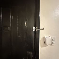 Canyon Cove Hotel & Spa Resort - Full view of the inside of our door with damage and the electric slot with the paper coaster shoved in it to make it work.