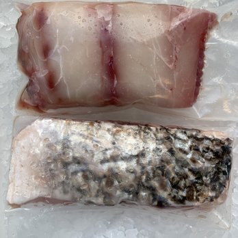 Seafood Express - two pieces of fish wrapped in ice - Seafood Markets Near Me - Skokie, Illinois