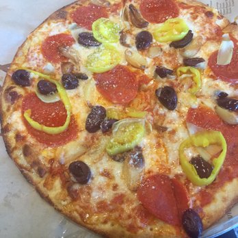 Pizza Artista - Make your own with artichoke, kalamata olives, roasted garlic, and banana peppers - Pizza Near Me - Lake Charles, Louisiana