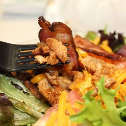 Grand Junction Grilled Subs - Bacon chicken salad.  Giant delicious bacon pieces. Next to Aces Nails & Spa.