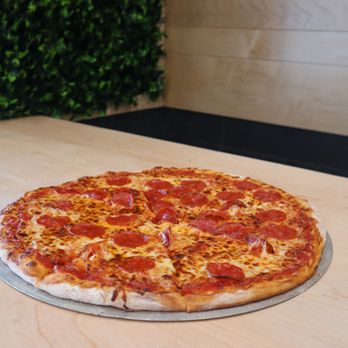 Pizza Melt - a pepperoni pizza on a pizza pan - Pizza Near Me - Cleveland, Ohio Pizza Melt - a pepperoni pizza on a pizza pan - Pizza Near Me - Cleveland, Ohio