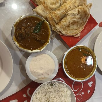 Chili's South Indian Restaurant - Kerala Goat Bone-In Curry and Kerala Fish (Boneless) Curry (Spicy) - Indian Near Me - Seattle, Washington Chili's South Indian Restaurant - Kerala Goat Bone-In Curry and Kerala Fish (Boneless) Curry (Spicy) - Indian Near Me - Seattle, Washington