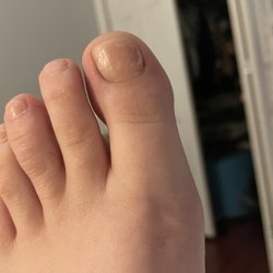 VS Nails Salon - Smudged paint, and no paint on the middle toe at all.