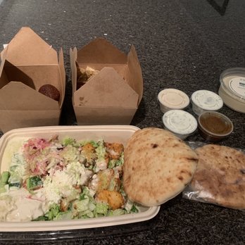 NAYA - Baked Zaatar Pita Chips Chicken Shish Taouk Salad Hummus Dip Cucumber Yogurt Dip Kibbe Falafel pcs - Mediterranean Near Me - New York, New York NAYA - Baked Zaatar Pita Chips Chicken Shish Taouk Salad Hummus Dip Cucumber Yogurt Dip Kibbe Falafel pcs - Mediterranean Near Me - New York, New York