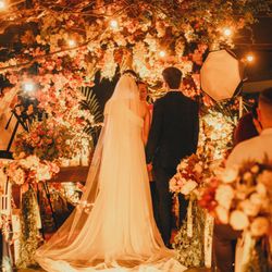 Cibus Mission - Photo by Breno Cardoso, wedding with outdoor themed arch and evening lighting.