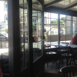 Brasserie d'en Face - Pretty, modern interior with comfortable benches and nice wood chairs & tables