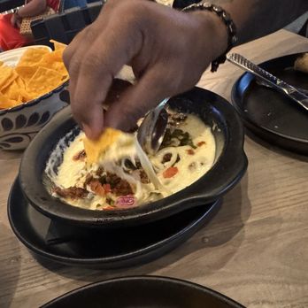 The Mexican STL - Queso... not a fan. An initial cheese pull, it's very thick cheese, but it becomes a block quickly. Definitely needs to thin it out. - Mexican Near Me - Sappington, Missouri The Mexican STL - Queso... not a fan. An initial cheese pull, it's very thick cheese, but it becomes a block quickly. Definitely needs to thin it out. - Mexican Near Me - Sappington, Missouri