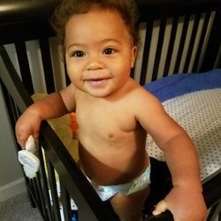 Dee Pullen, doula - Still breastfeeding after a year. Look at that healthy, smiling baby!