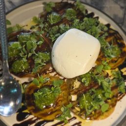 Burrata caprese salad-- unusually good! Burrata caprese salad-- unusually good!