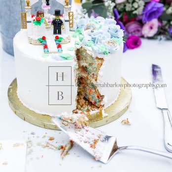 WHISK - a wedding cake with a slice taken out of it - Bakeries Near Me - Wheeling, West Virginia