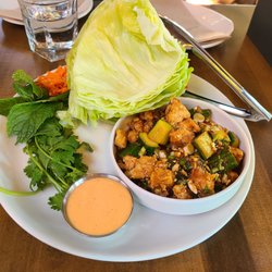 Moxies Victoria Restaurant - These Thai inspired Cashew Chicken Lettuce Wraps are bursting with flavor. On the side is a spicy (more mild) mayo. A great app to share.